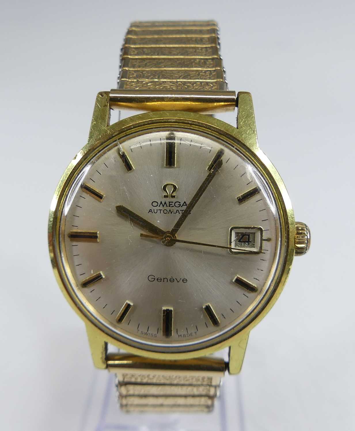 Lot 2642 - An Omega Geneve vintage gent's gold plated...