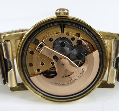 Lot 2642 - An Omega Geneve vintage gent's gold plated...
