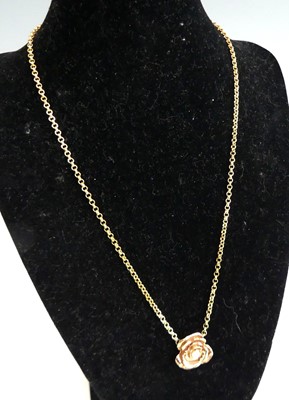 Lot 2682 - A 9ct gold diamond set pendant, arranged as a...