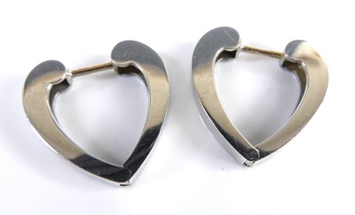 Lot 2614 - A pair of contemporary 9ct white gold earrings,...