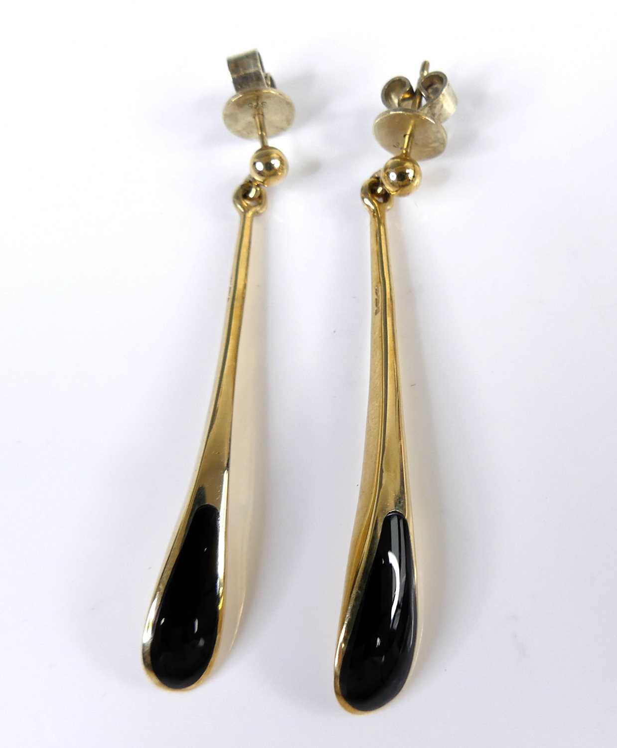 Lot 2619 - A pair of contemporary 9ct gold and polished...