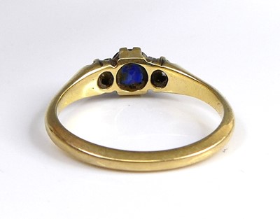Lot 2604 - An 18ct gold sapphire and diamond three-stone...