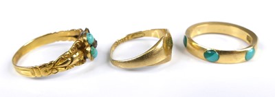 Lot 2608 - An 18ct gold and turquoise set band ring (one...