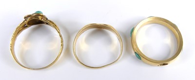 Lot 2608 - An 18ct gold and turquoise set band ring (one...