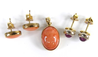 Lot 2653 - A pair of yellow and white metal cabochon...