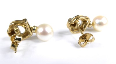 Lot 2683 - A pair of 18ct gold cultured pearl and blue...