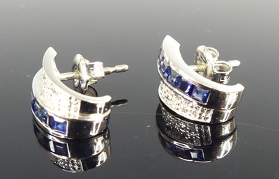 Lot 2684 - A pair of 14ct white gold sapphire and diamond...