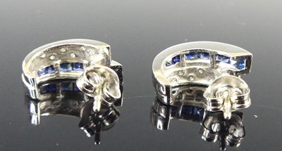 Lot 2684 - A pair of 14ct white gold sapphire and diamond...