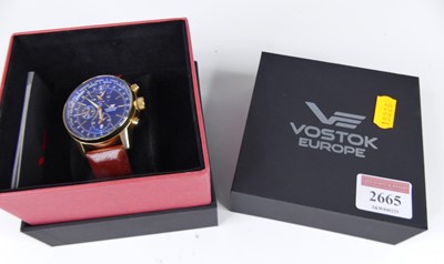 Lot 2665 - A Vostok Europe stainless steel gilt plated...