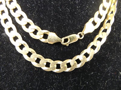 Lot 2673 - A modern 9ct gold flat curblink necklace, with...