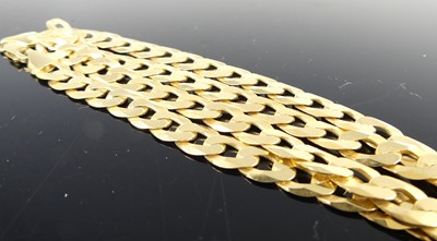 Lot 2673 - A modern 9ct gold flat curblink necklace, with...