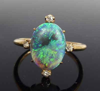 Lot 2676 - A rose metal opal and diamond dress ring, the...