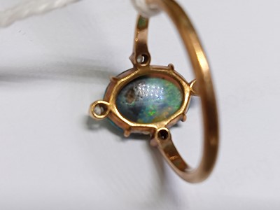 Lot 2676 - A rose metal opal and diamond dress ring, the...
