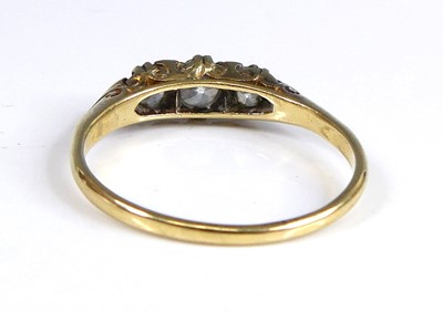 Lot 2687 - A yellow metal diamond 3 stone ring featuring...