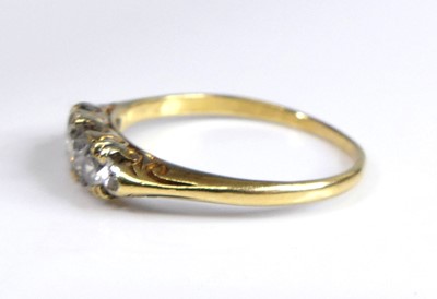 Lot 2687 - A yellow metal diamond 3 stone ring featuring...