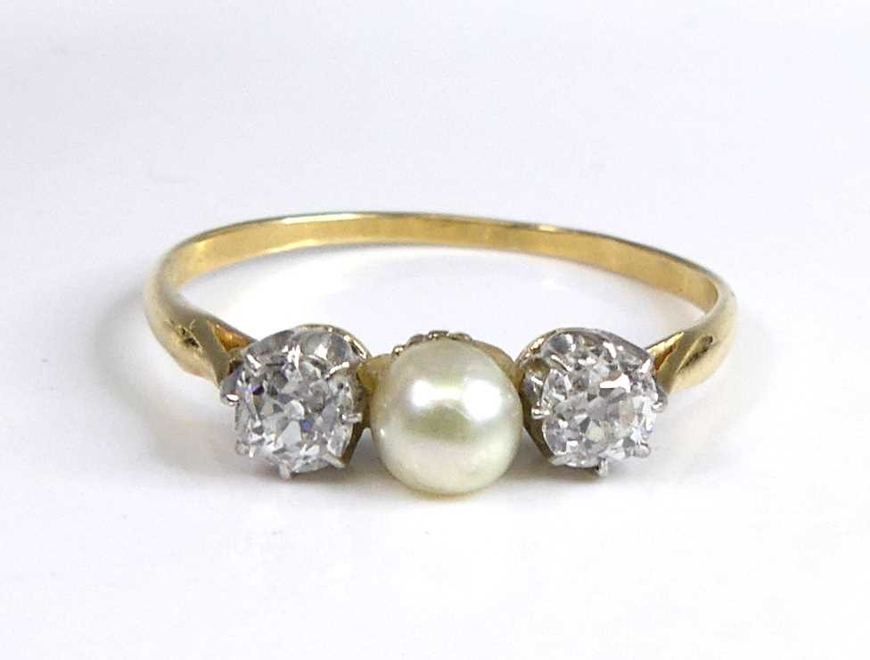 Lot 2688 - A yellow and white metal pearl and diamond 3...