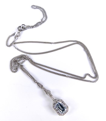 Lot 2689 - A 9ct white gold aquamarine and diamond...