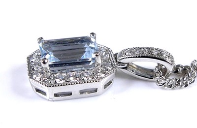 Lot 2689 - A 9ct white gold aquamarine and diamond...