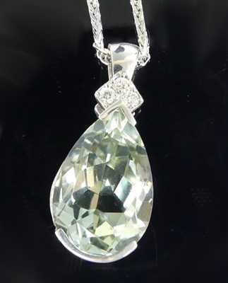 Lot 2690 - A 9ct white gold prasiolite and diamond...