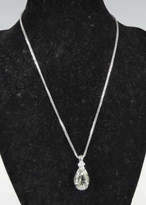 Lot 2690 - A 9ct white gold prasiolite and diamond...