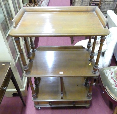 Lot 1320 - A Victorian walnut canterbury whatnot, with...