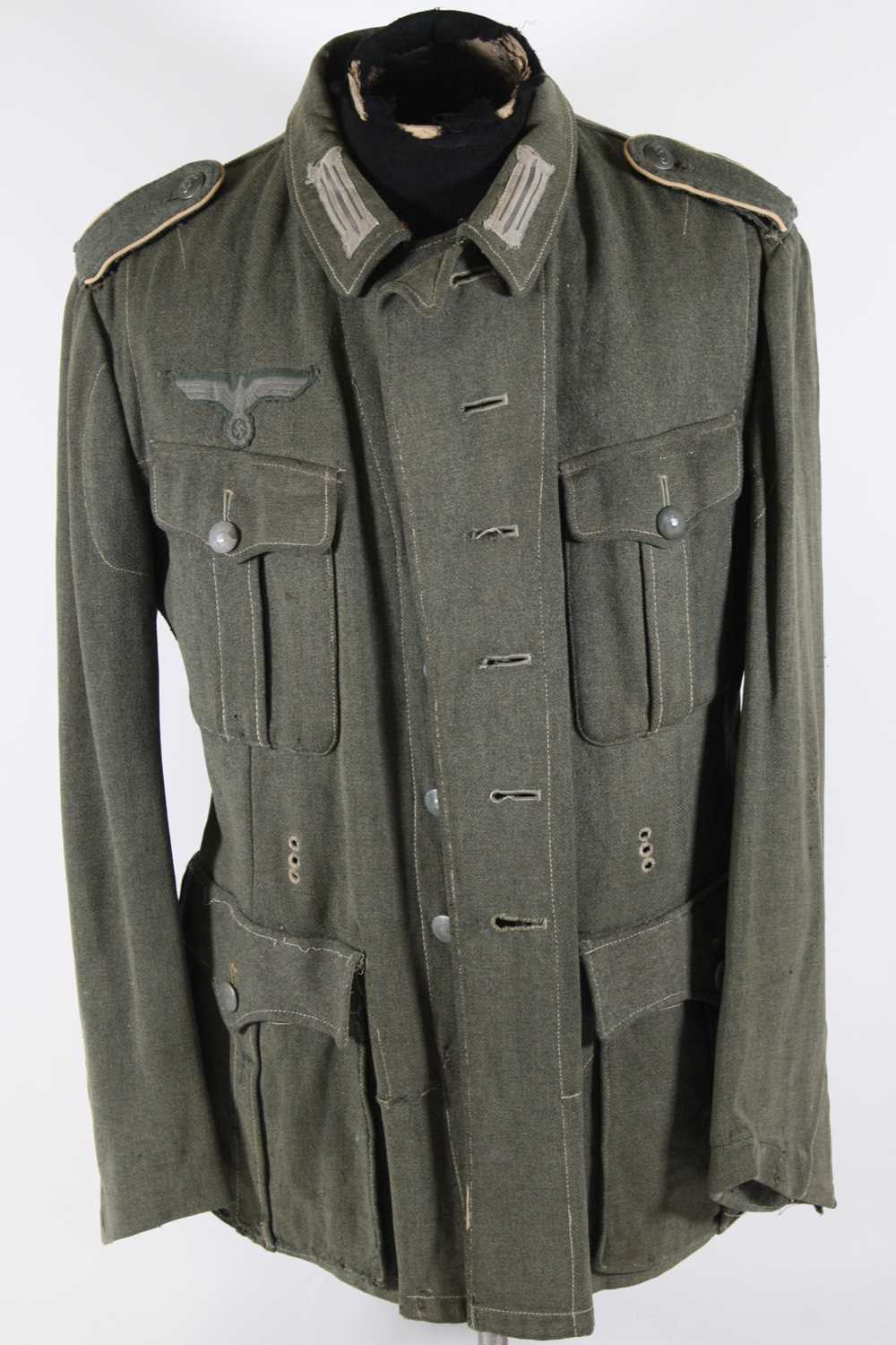 Lot 3207 - A German Third Reich M-43? Heer tunic, in...