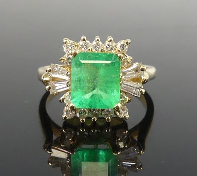 Lot 2542 - A yellow metal emerald and diamond rectangular...