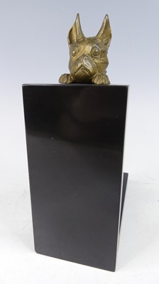 Lot 82 - An Art Deco bronze and black slate single book-...