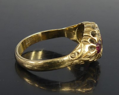 Lot 2582 - A yellow metal ruby and diamond triple cluster...