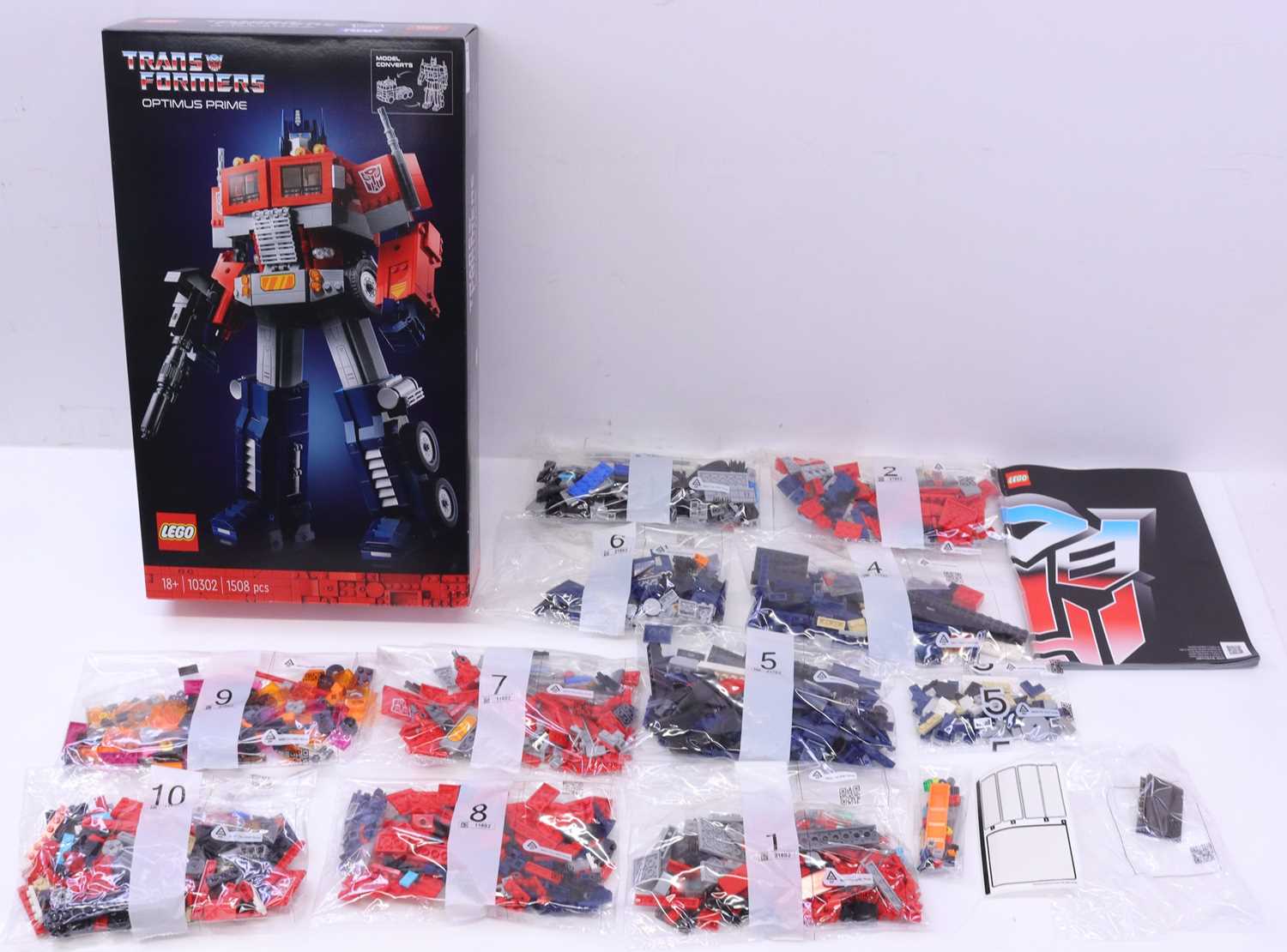 Lot 1557 - Lego, Hasbro, Takara Tomy No.10302...
