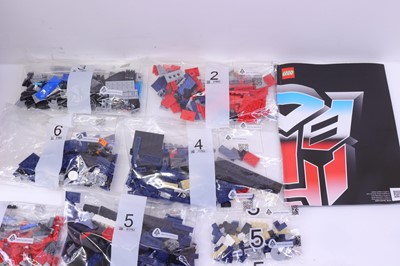 Lot 1557 - Lego, Hasbro, Takara Tomy No.10302...