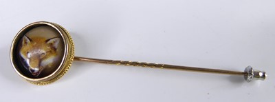 Lot 2599 - A vintage yellow metal gent's tie-pin, set...