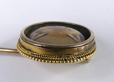 Lot 2599 - A vintage yellow metal gent's tie-pin, set...