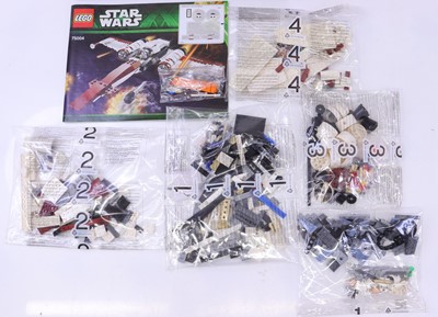 Lot 35 - Lego Disney Star Wars group of four sets to...