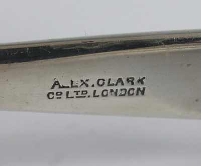 Lot 2100 - A pair of George V silver serving tongs, maker...