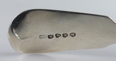 Lot 2101 - A George IV silver fish slice, in the Fiddle...
