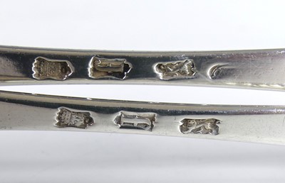 Lot 2065 - A pair of George II silver berry spoons,...