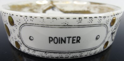 Lot 65 - Fornasetti - a circular ceramic dish, titled...