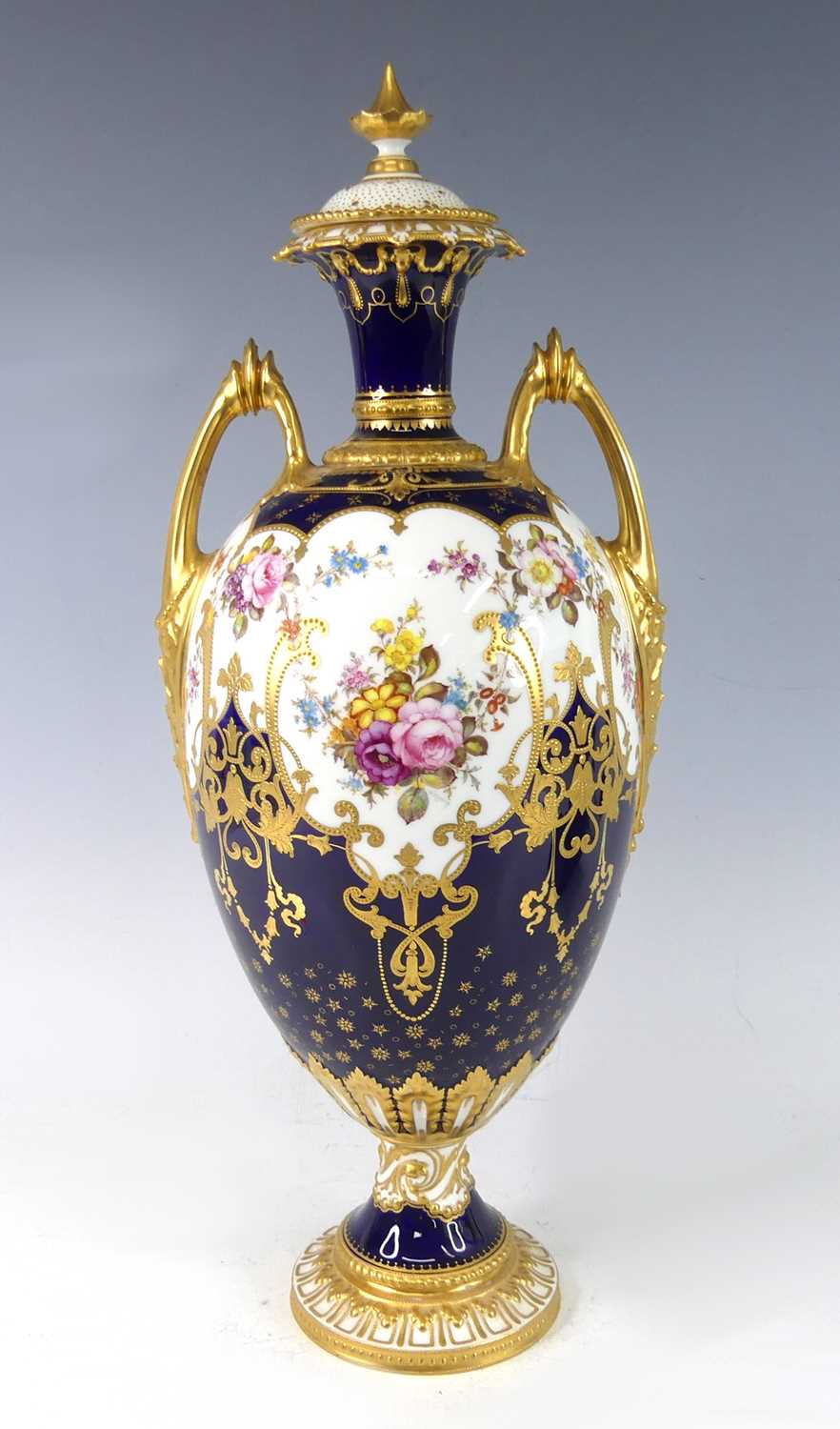 Lot 2040 - An Edwardian Royal Crown Derby twin handled...