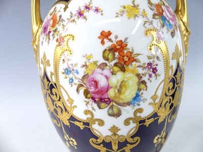 Lot 2040 - An Edwardian Royal Crown Derby twin handled...