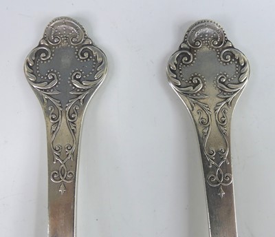 Lot 2064 - A pair of Edwardian silver fancy-back dognose...