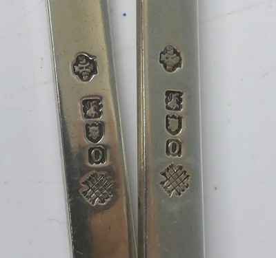 Lot 2064 - A pair of Edwardian silver fancy-back dognose...