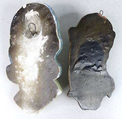 Lot 23 - Two 1930s painted plaster wall masks, each...