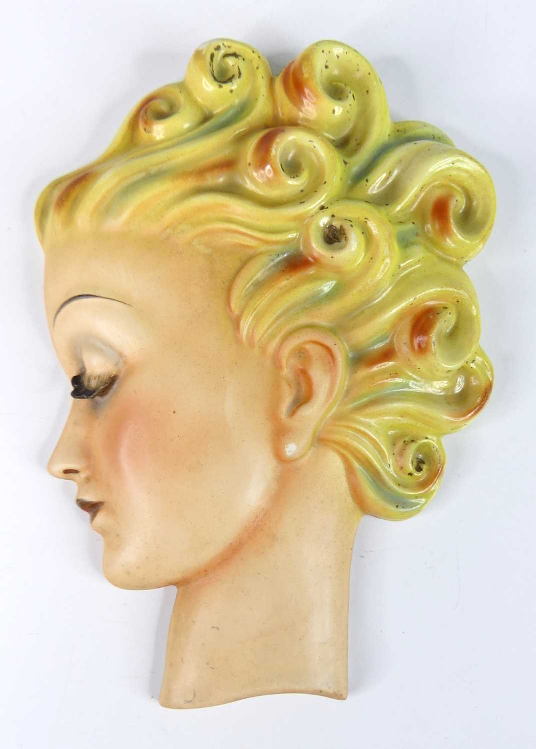 Lot 29 - A 1930s Goebel pottery wall mask, modelled as...