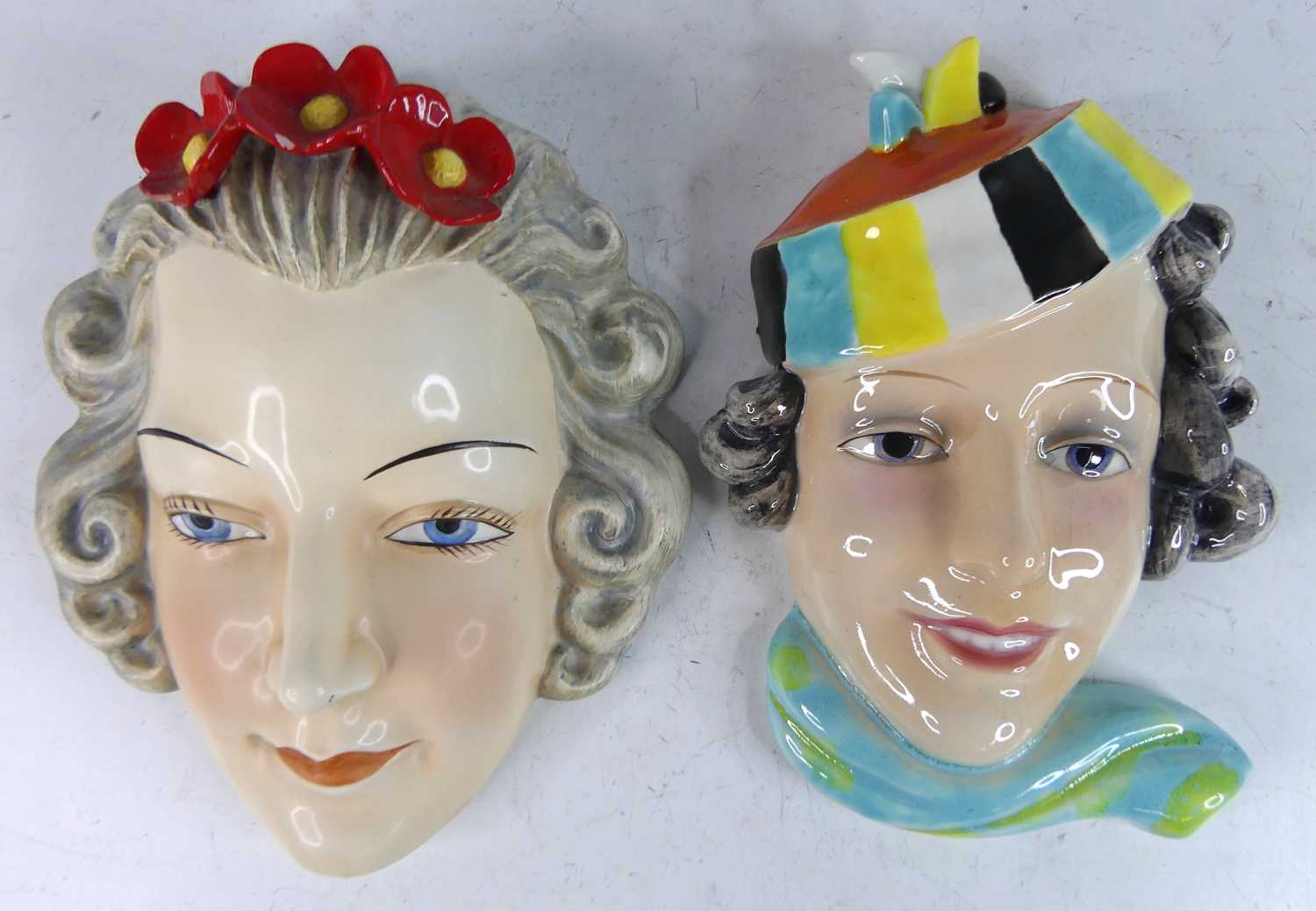 Lot 27 - Two 1930s Goebel pottery wall masks, each...