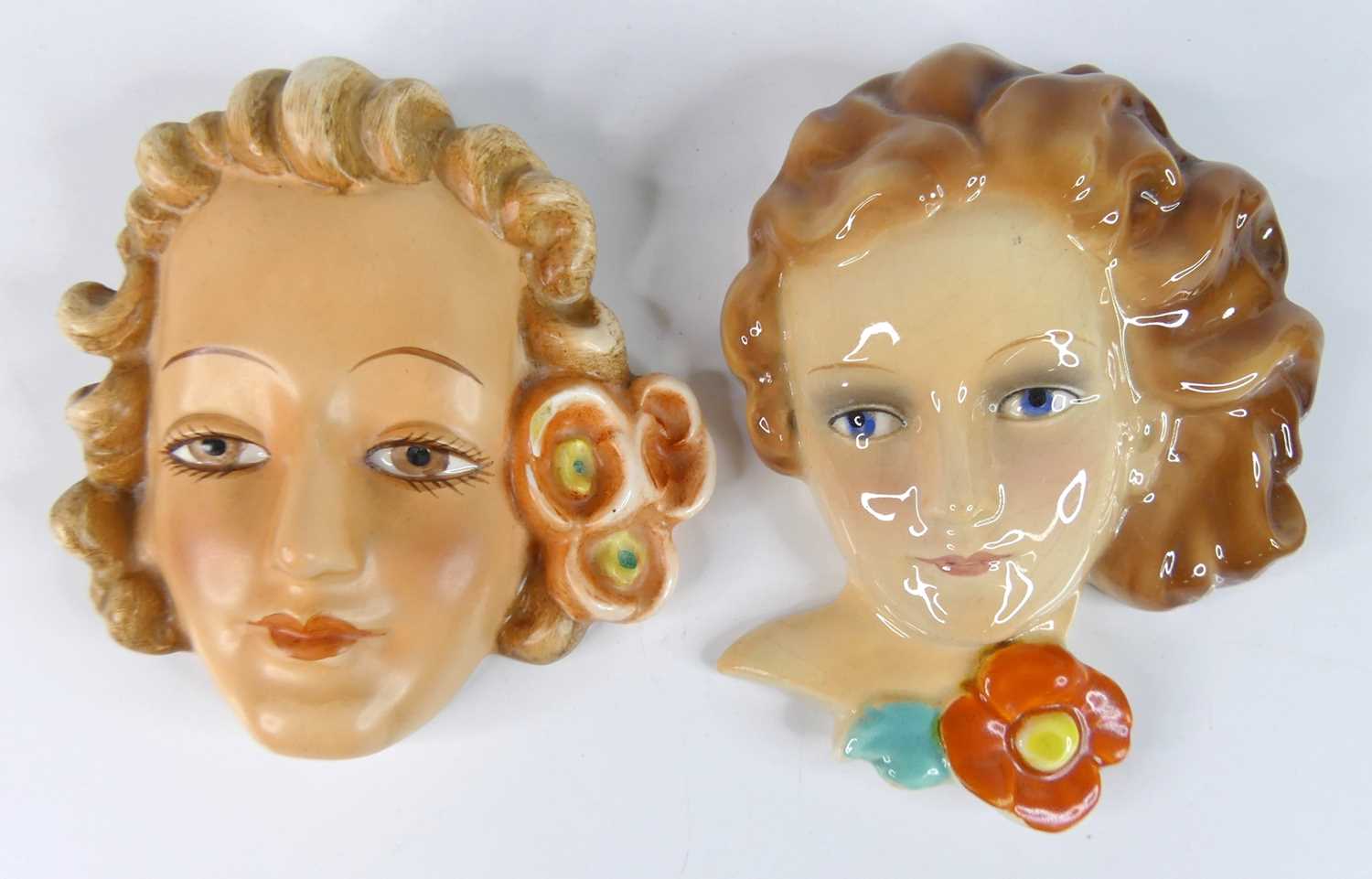 Lot 26 - Two small 1930s Goebel wall masks, one...