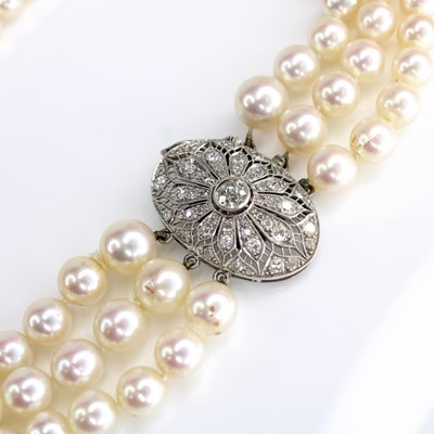 Lot 2031 - A three-row pearl choker, comprising 43, 44...