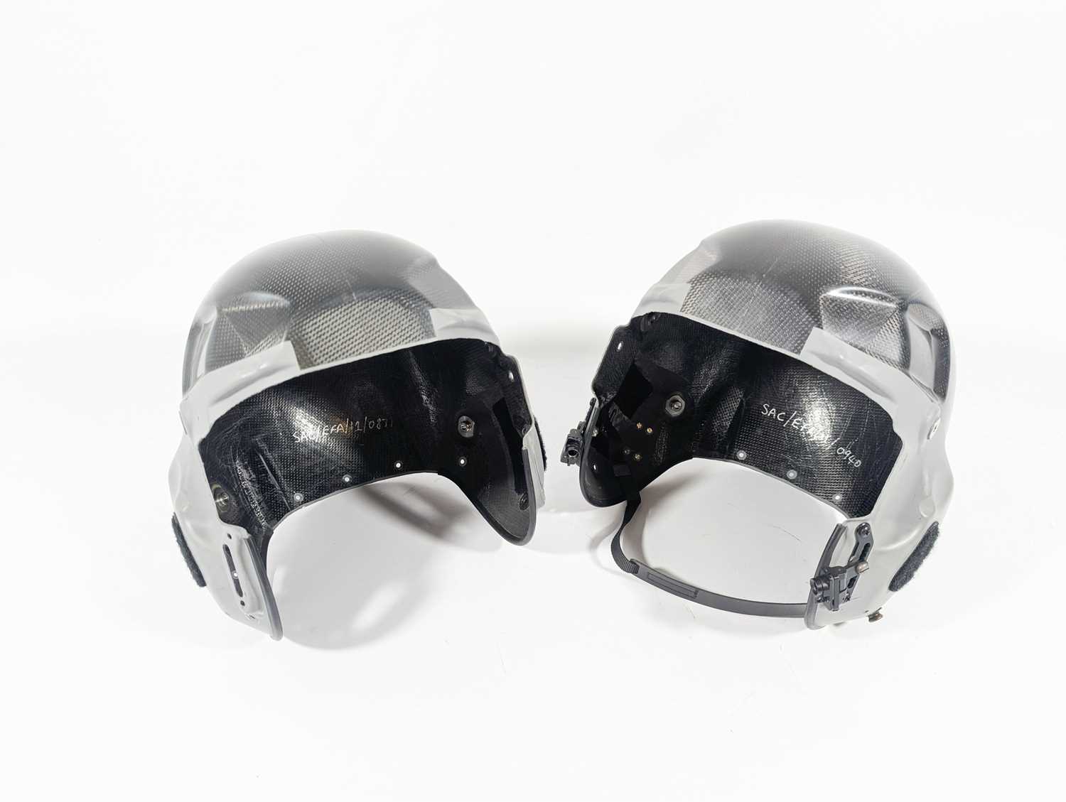 Lot 7 - A pair of RAF Typhoon helmet shells, a pair of...