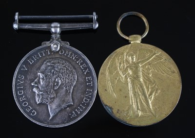 Lot 18 - A pair of WW I British War and Victory medals,...