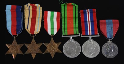 Lot 98 - A group of six medals to include WW II...